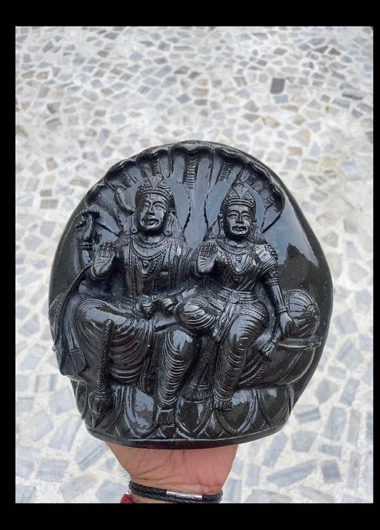 Vishnu bhagwan and laxmi in Shaligram